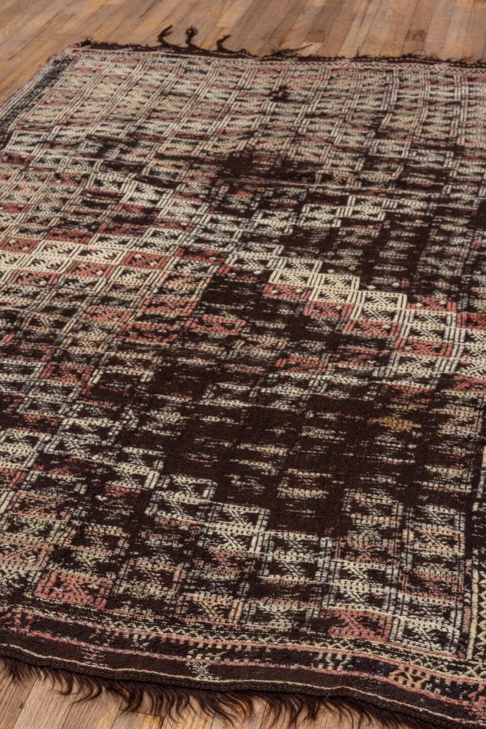 4' x 7' one-of-a-kind handmade vintage Jijim rug. Color palette: dark brown, ivory, rose, taupe, charcoal, brown, pink, red