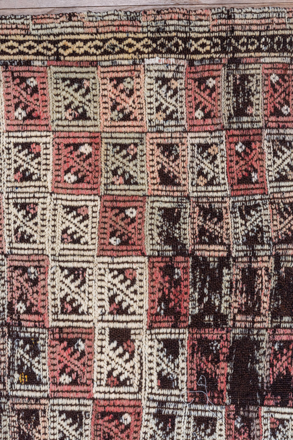 4' x 7' one-of-a-kind handmade vintage Jijim rug. Color palette: dark brown, ivory, rose, taupe, charcoal, brown, pink, red