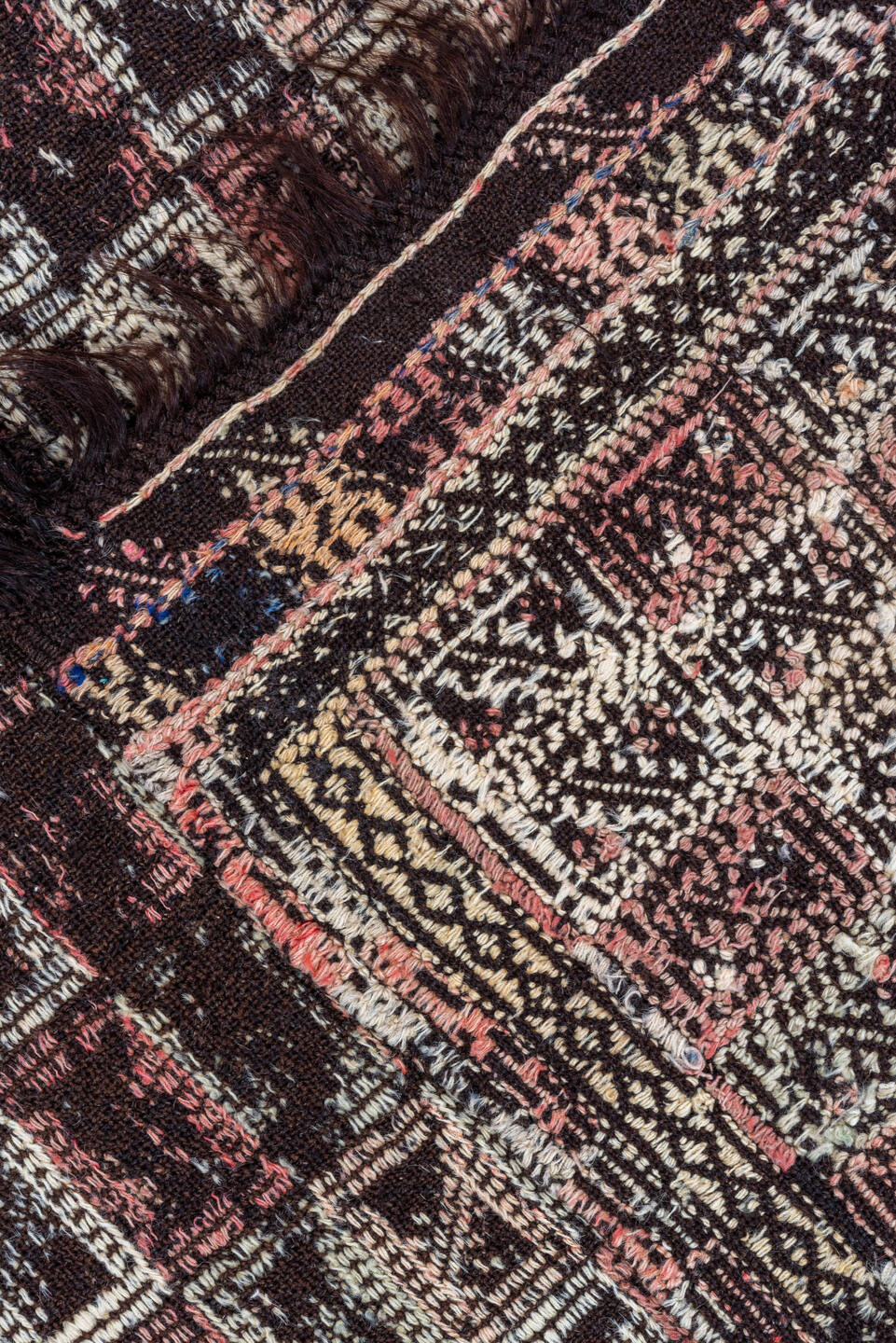 4' x 7' one-of-a-kind handmade vintage Jijim rug. Color palette: dark brown, ivory, rose, taupe, charcoal, brown, pink, red