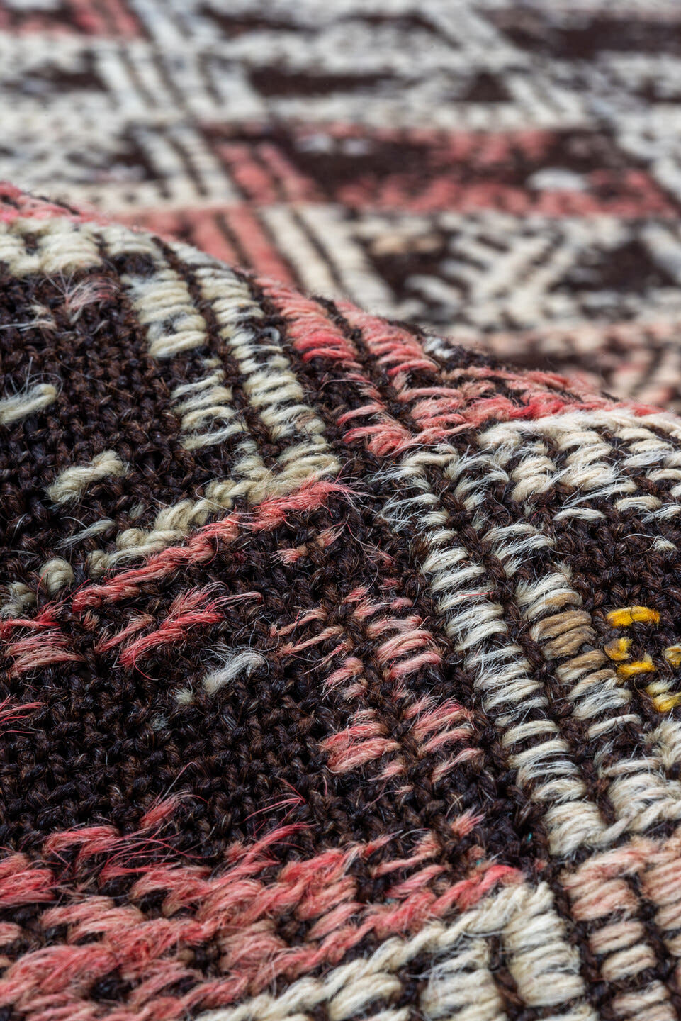 4' x 7' one-of-a-kind handmade vintage Jijim rug. Color palette: dark brown, ivory, rose, taupe, charcoal, brown, pink, red