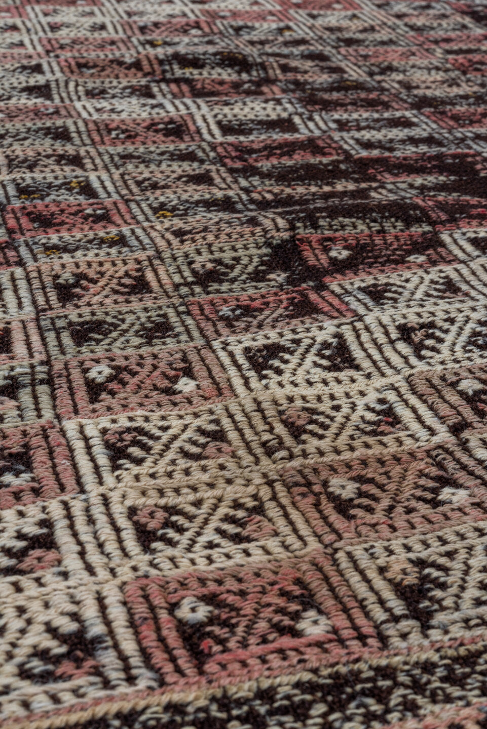 4' x 7' one-of-a-kind handmade vintage Jijim rug. Color palette: dark brown, ivory, rose, taupe, charcoal, brown, pink, red