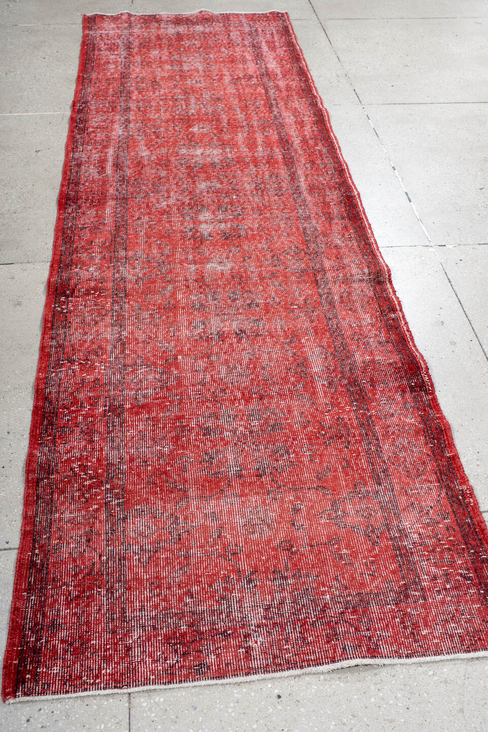 3' x 10' one-of-a-kind handmade vintage Overdyed runner rug. Color palette: crimson, rose, burgundy, ivory, red, pink