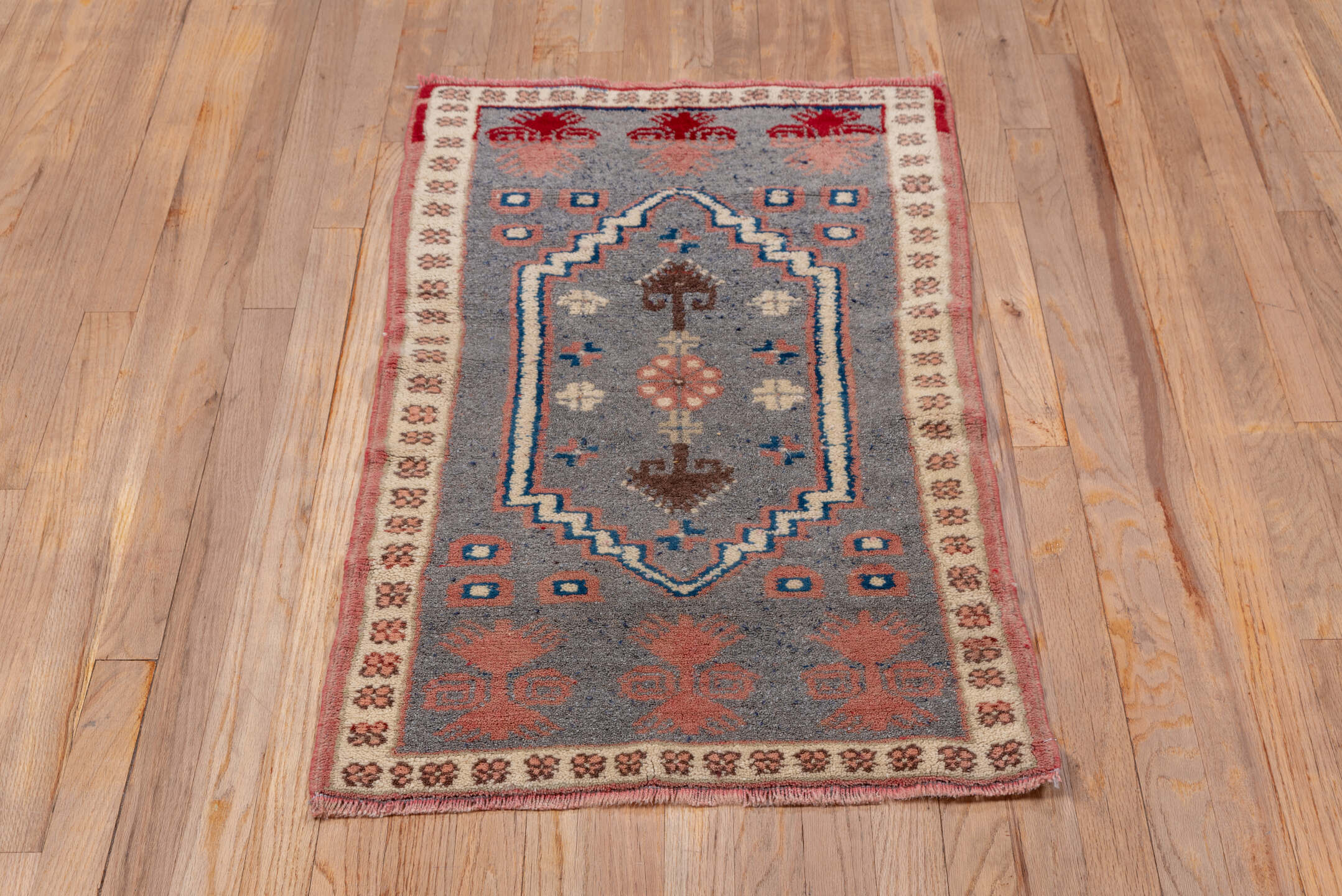 2' x 3' one-of-a-kind handmade vintage Oushak small size rug. Color palette: blue, brown, gray, light gray, pink, red