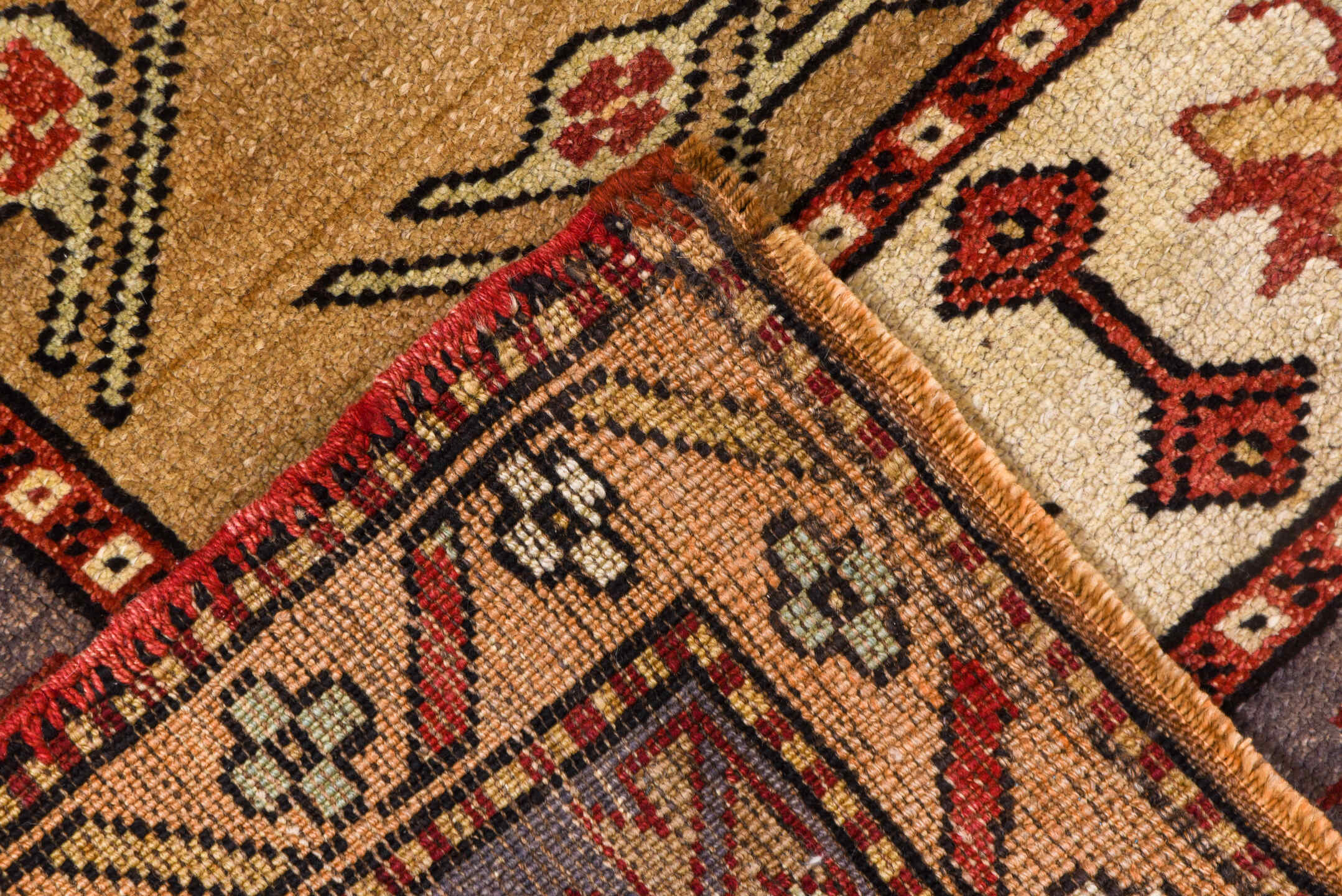 5' x 10' one-of-a-kind handmade vintage Kars medium size rug. Color palette: tan, rust, ivory, lavender, brick, taupe