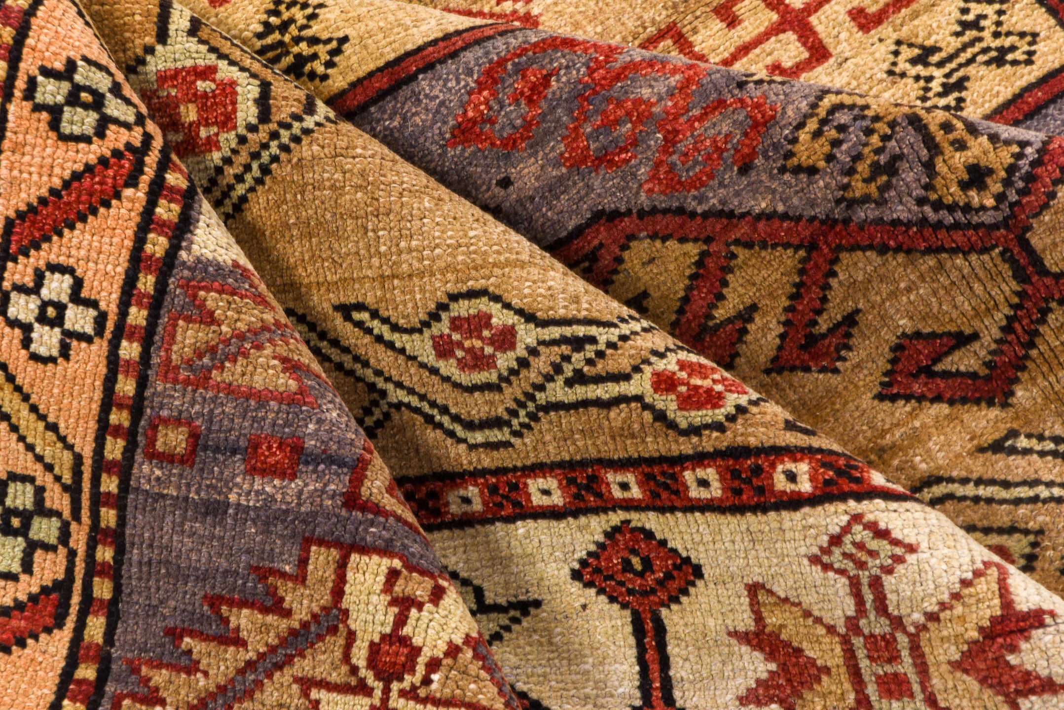 5' x 10' one-of-a-kind handmade vintage Kars medium size rug. Color palette: tan, rust, ivory, lavender, brick, taupe