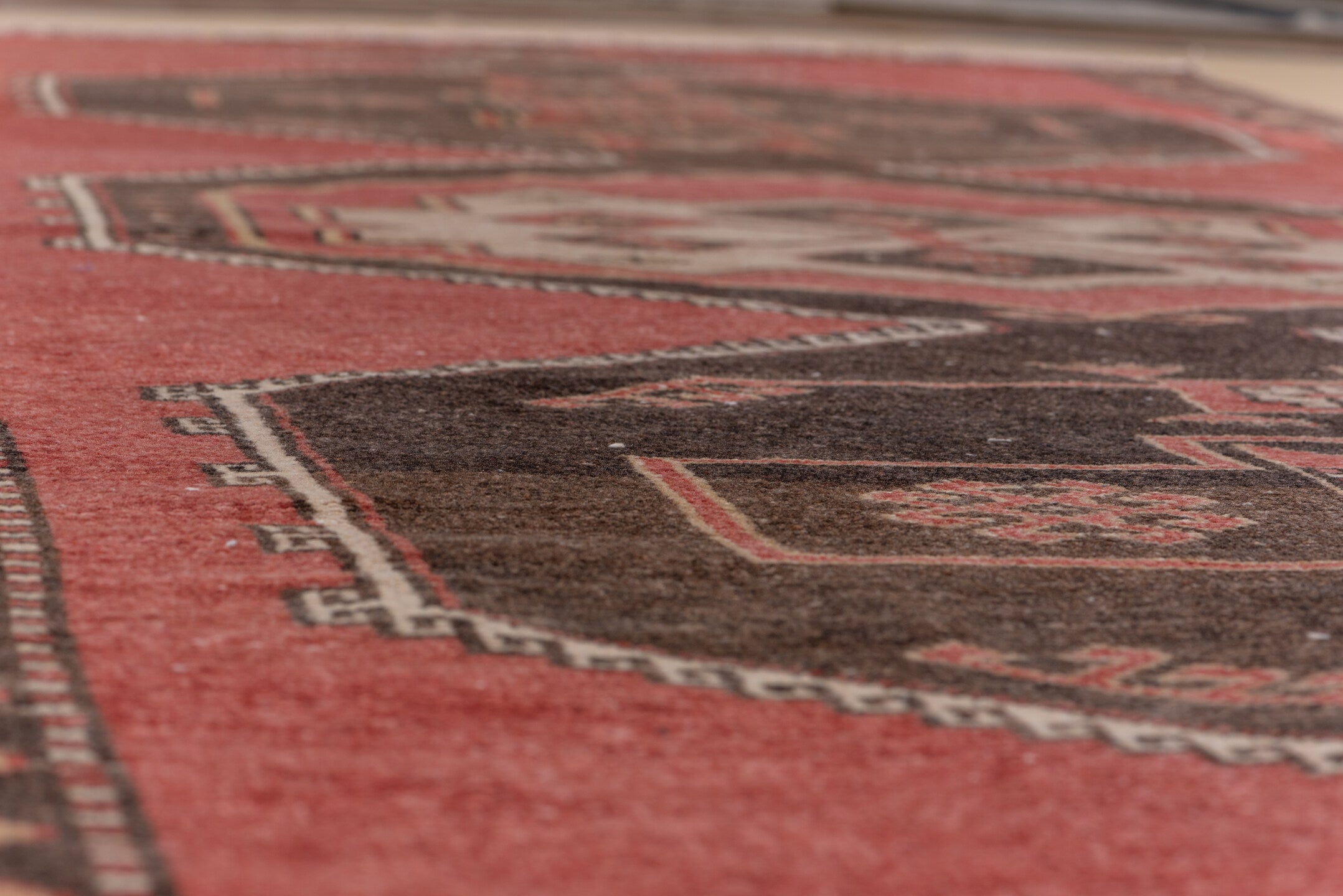 4' x 11' one-of-a-kind handmade vintage Oushak runner rug. Color palette: brown, gray, indian red, light gray, off-white