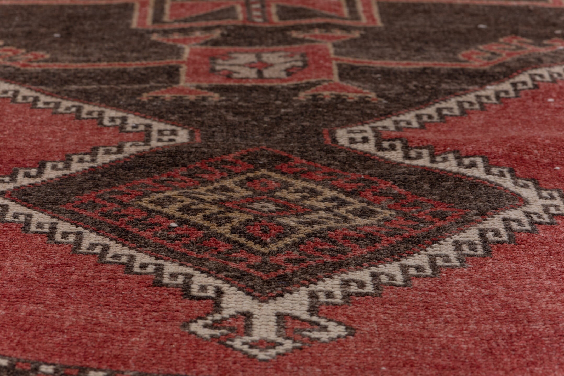 4' x 11' one-of-a-kind handmade vintage Oushak runner rug. Color palette: brown, gray, indian red, light gray, off-white
