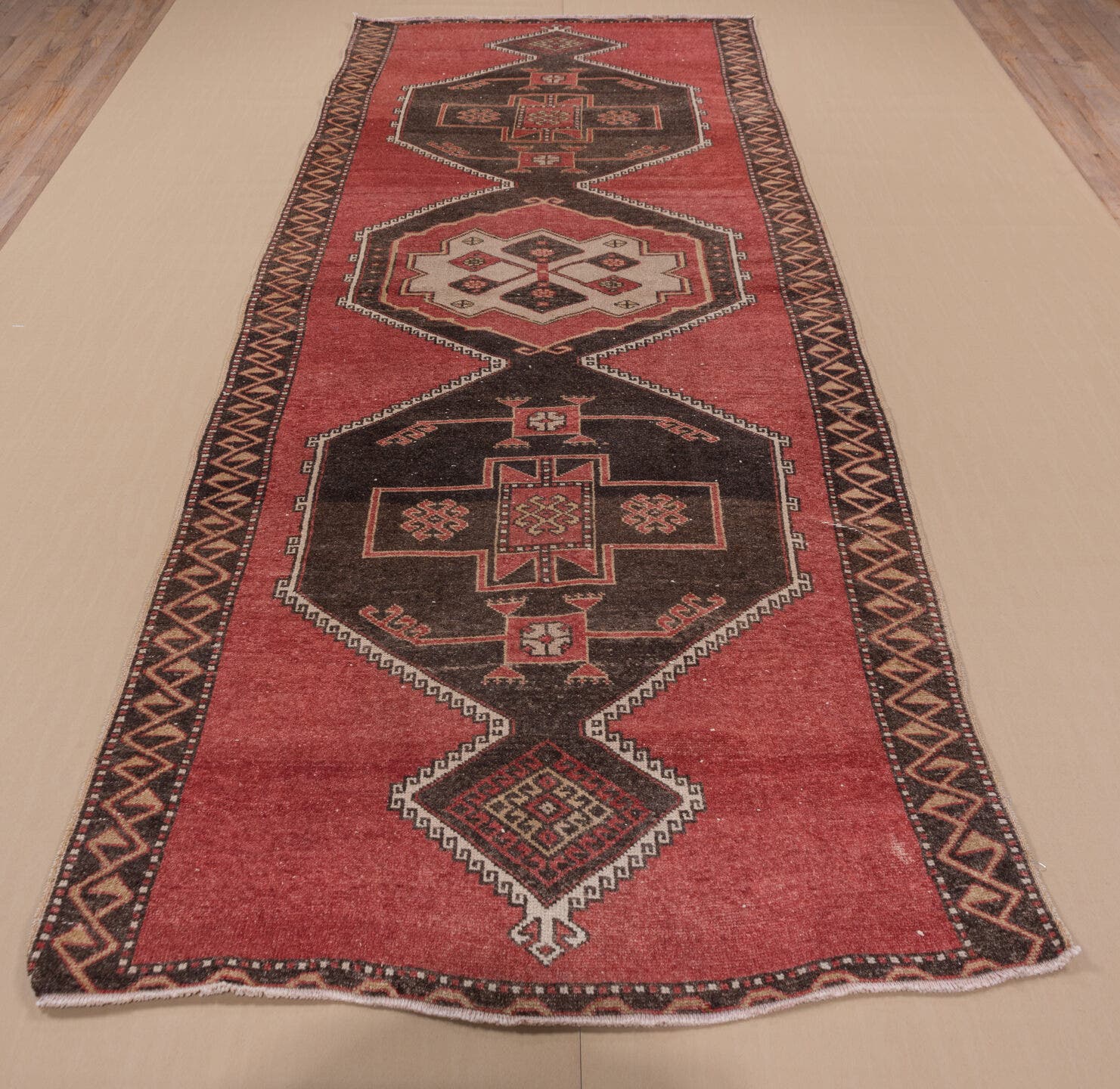 4' x 11' one-of-a-kind handmade vintage Oushak runner rug. Color palette: rust, charcoal, ivory, rose, burgundy, taupe