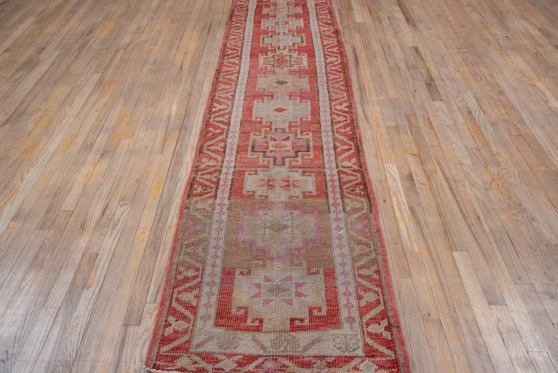 2' x 12' one-of-a-kind handmade vintage Oushak runner rug. Color palette: brown, gray, pink, red, rosy brown