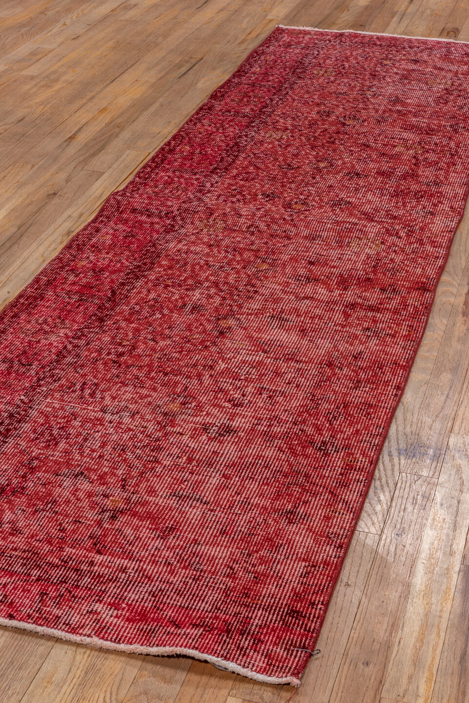 2' x 8' one-of-a-kind handmade vintage Overdyed runner rug. Color palette: brown, off-white, pink, red, snow, white