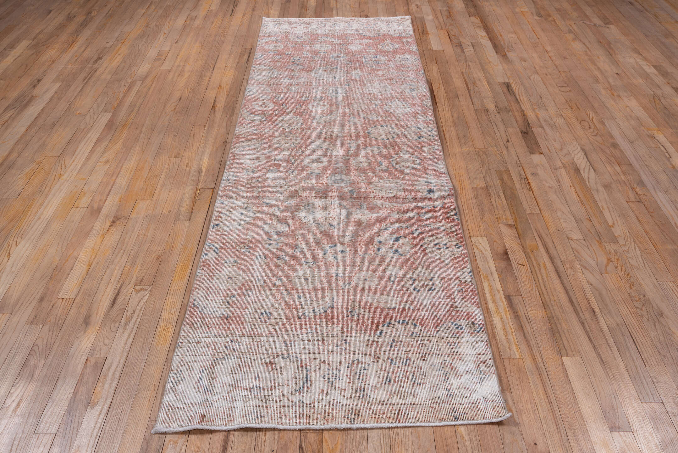 3' x 10' one-of-a-kind handmade vintage Oushak runner rug. Color palette: blush, ivory, dusty rose, pale blue, taupe, beige