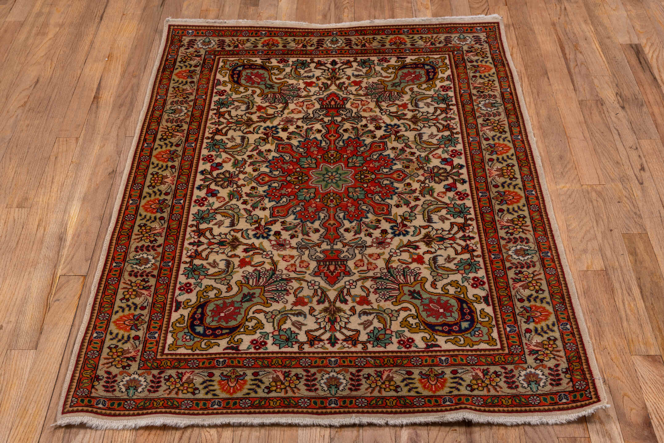 3' x 5' one-of-a-kind handmade vintage Tabriz small size rug. Color palette: ivory, rust, coral, sage, navy, gold, brown