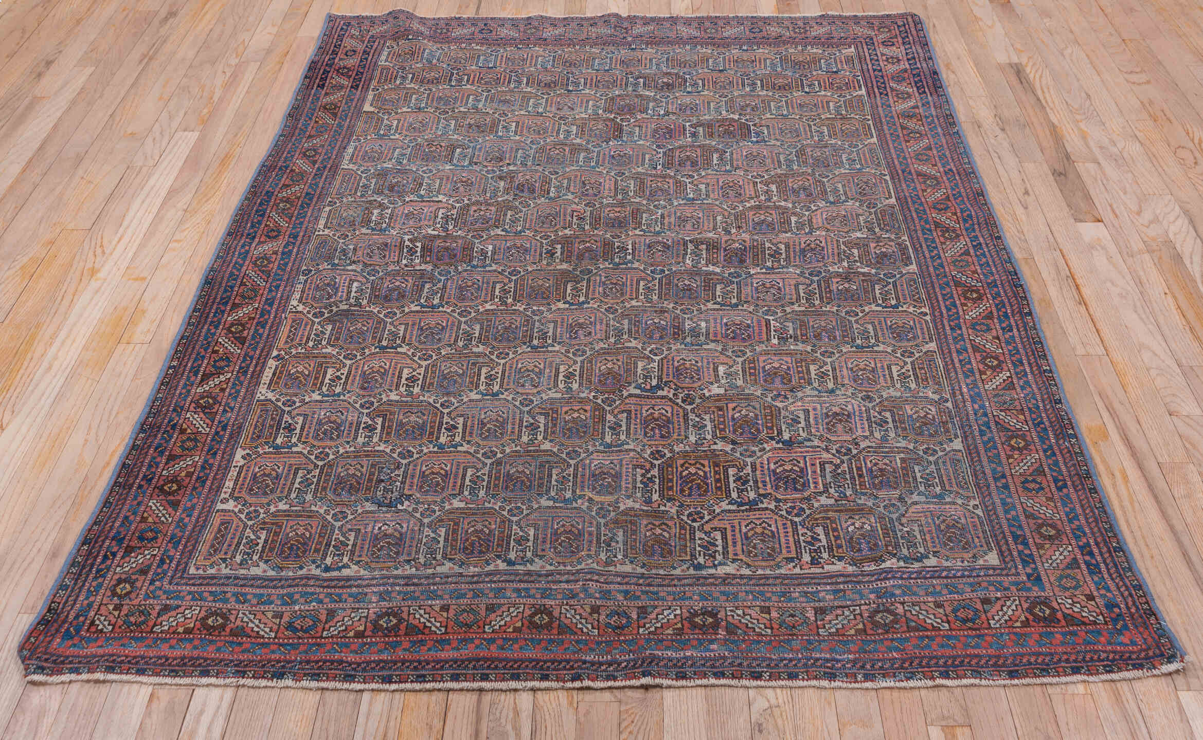 5' x 6' one-of-a-kind handmade vintage Afshar rug. Color palette: blue, brown, dark gray, gray, light gray, off-white, pink