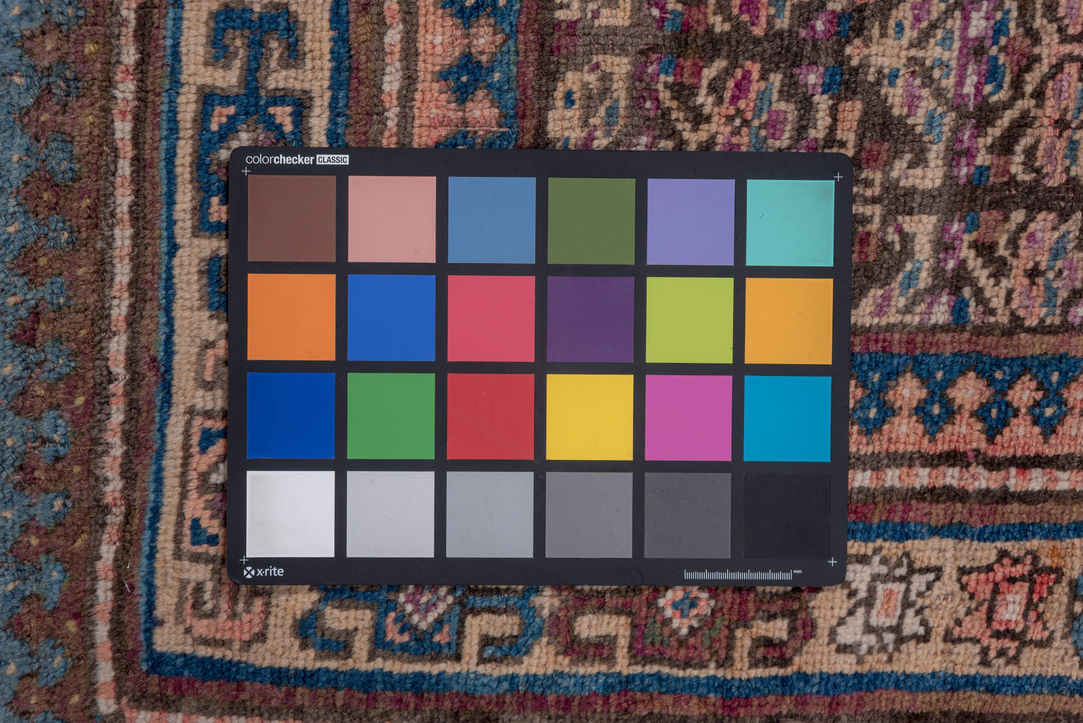 3' x 6' one-of-a-kind handmade antique Kurd small size rug. Color palette: brown, ivory, indigo, sky blue, rose, burgundy