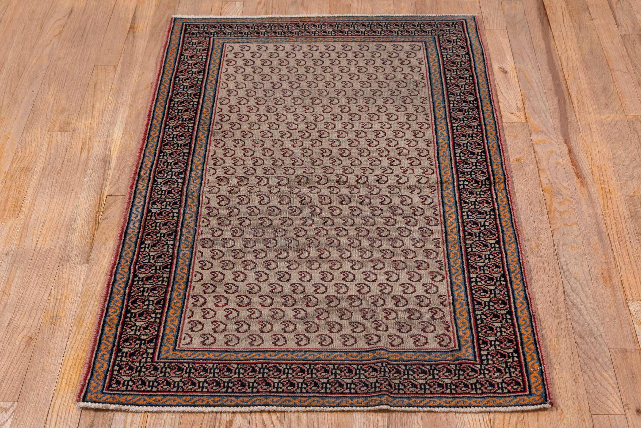 3' x 9' one-of-a-kind handmade antique Sarab runner rug. Color palette: ivory, navy, rust, camel, brown, slate, blue