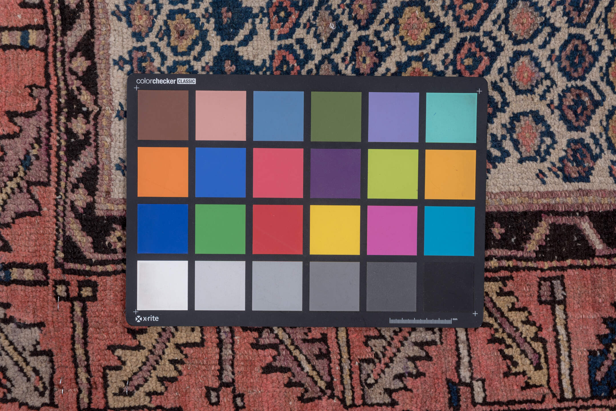 4' x 10' one-of-a-kind handmade vintage Malayer runner rug. Color palette: black, blue, brown, charcoal, gray, pink, red