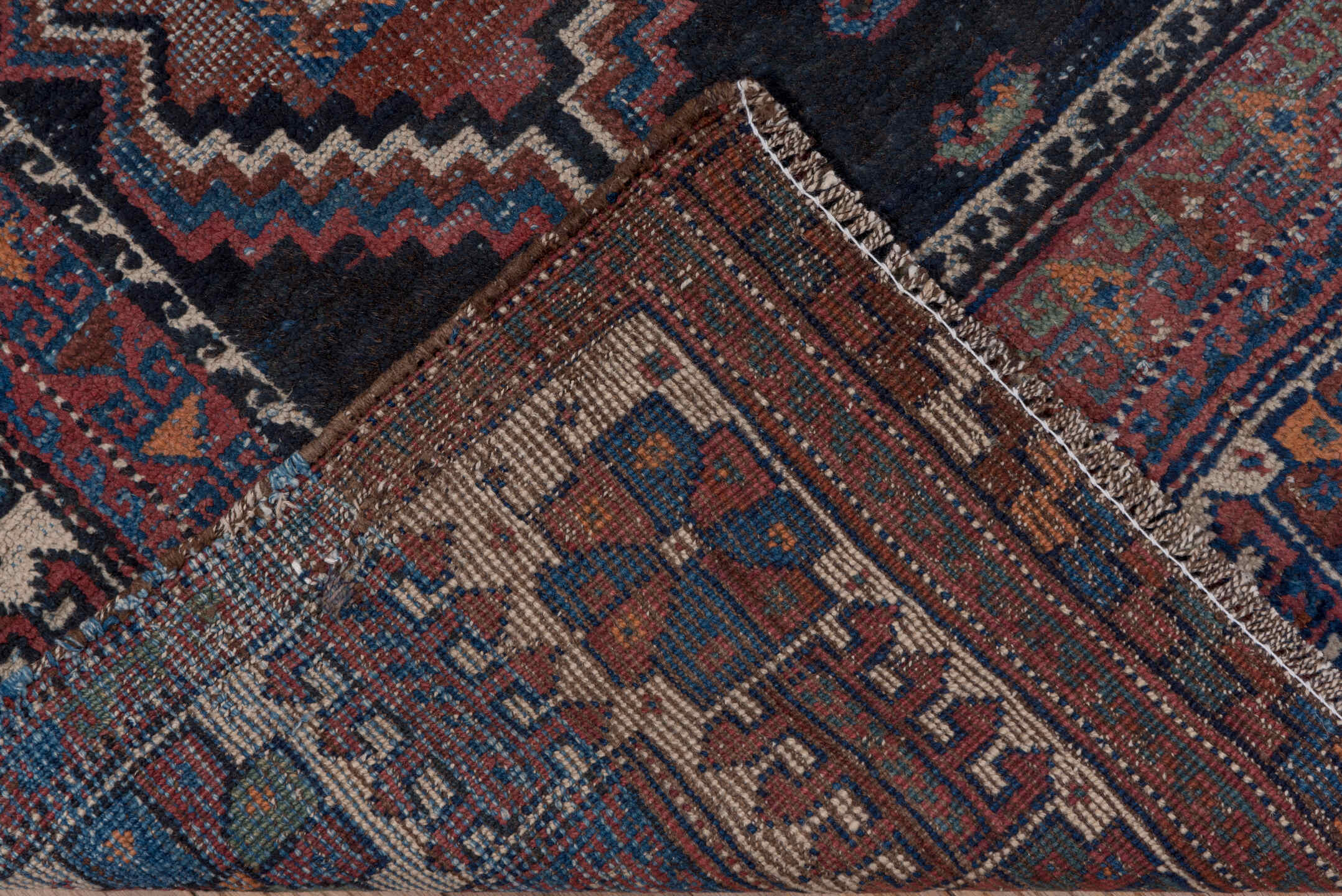 3' x 5' one-of-a-kind handmade antique Afshar small size rug. Color palette: indigo, rust, ivory, cobalt, camel, terracotta
