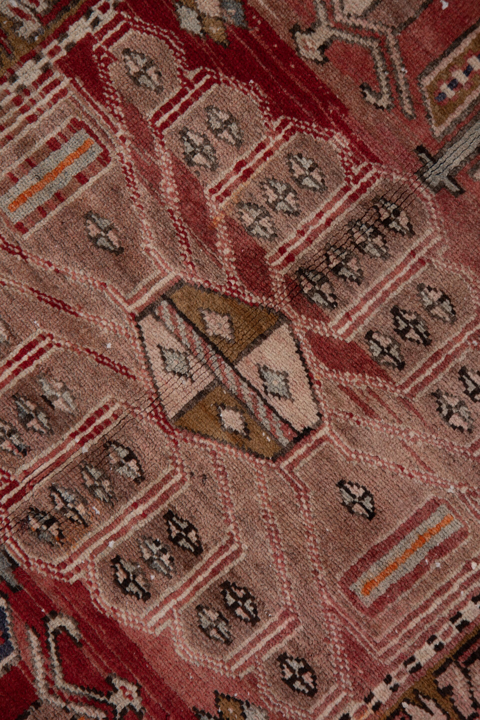 3' x 10' one-of-a-kind handmade vintage Heriz runner rug. Color palette: brick red, ivory, rose, rust, taupe, navy, orange