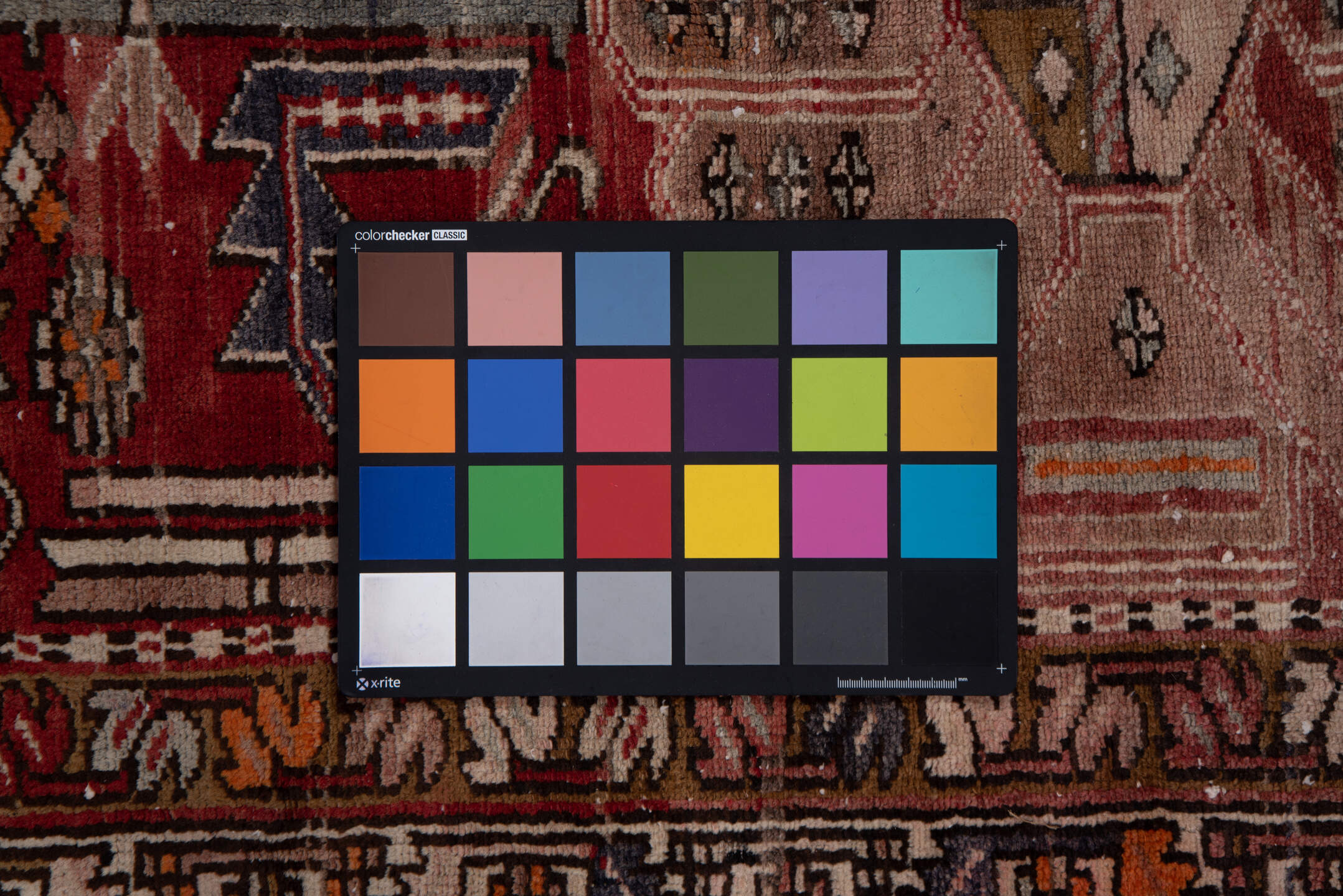 3' x 10' one-of-a-kind handmade vintage Heriz runner rug. Color palette: brick red, ivory, rose, rust, taupe, navy, orange