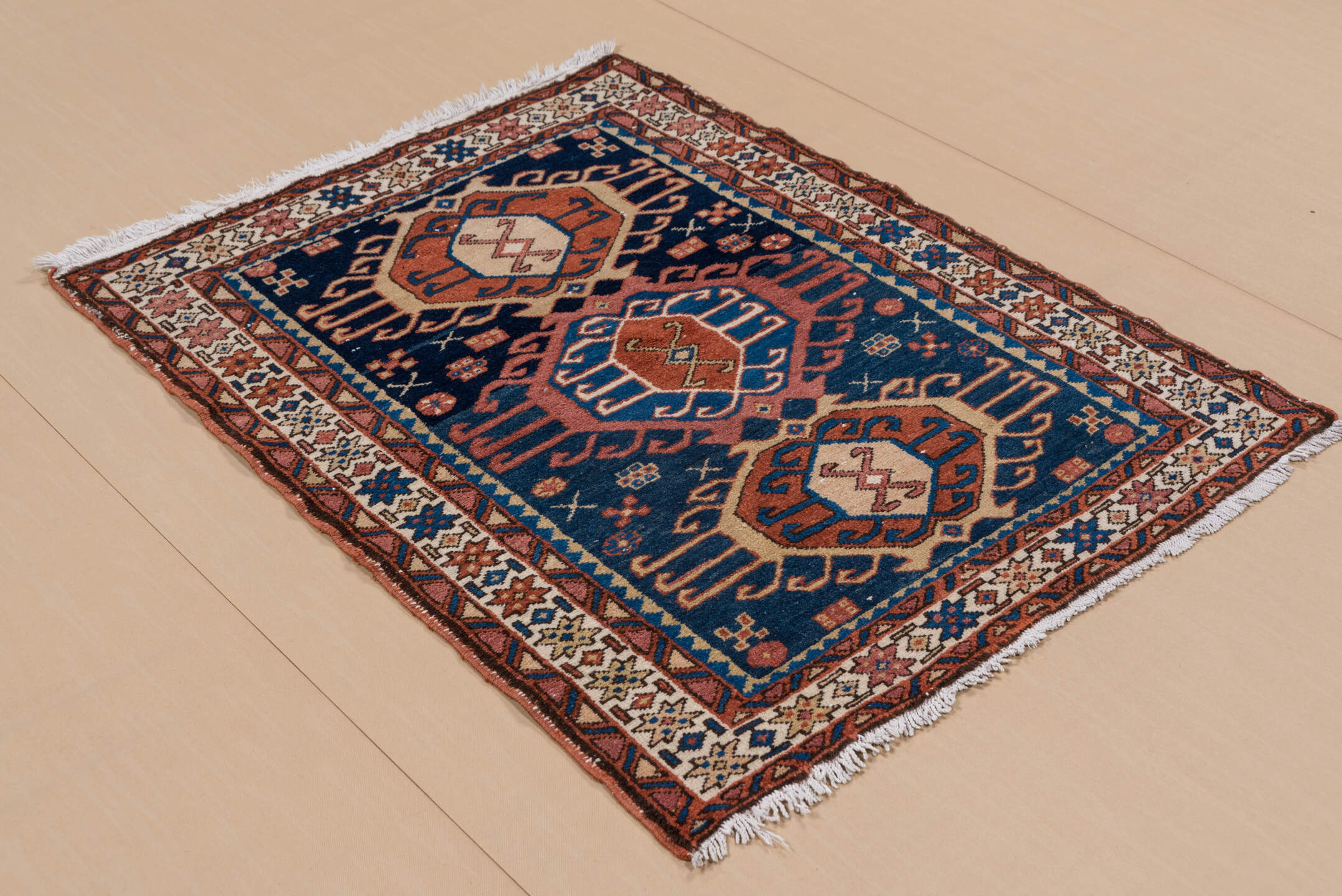 3' x 4' one-of-a-kind handmade vintage Karaje small size rug. Color palette: blue, brown, gray, light gray, off-white, pink