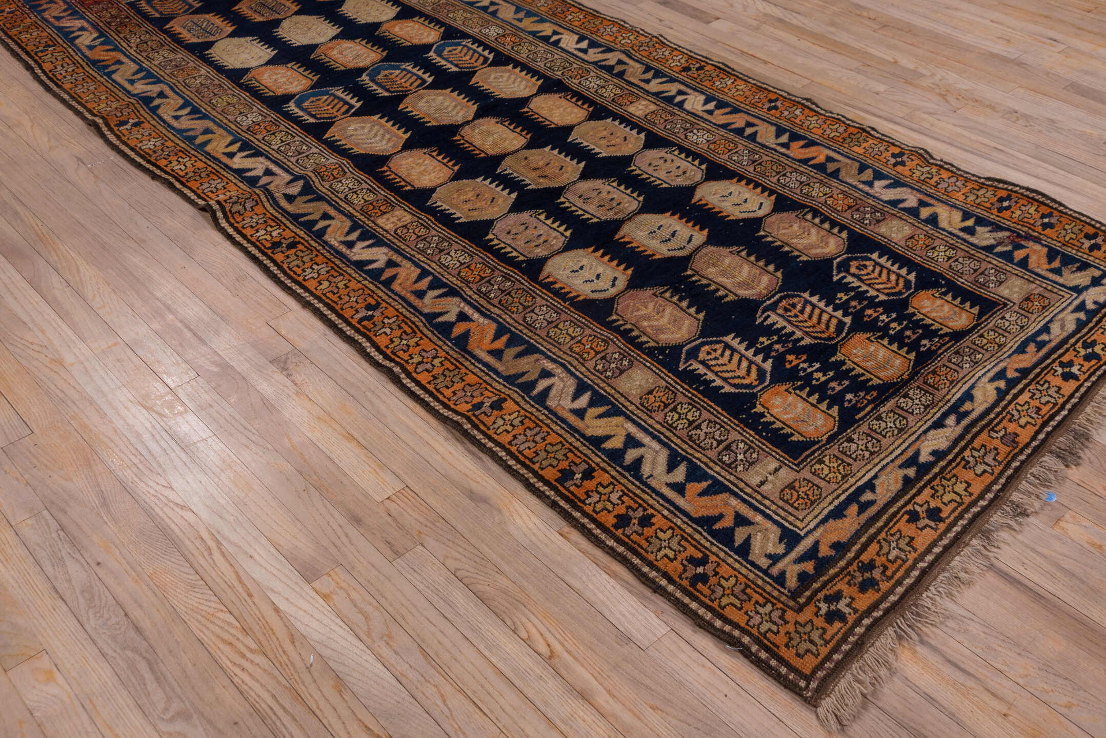 4' x 10' one-of-a-kind handmade vintage Karabagh runner rug. Color palette: blue, brown, gray, light gray, pink, red