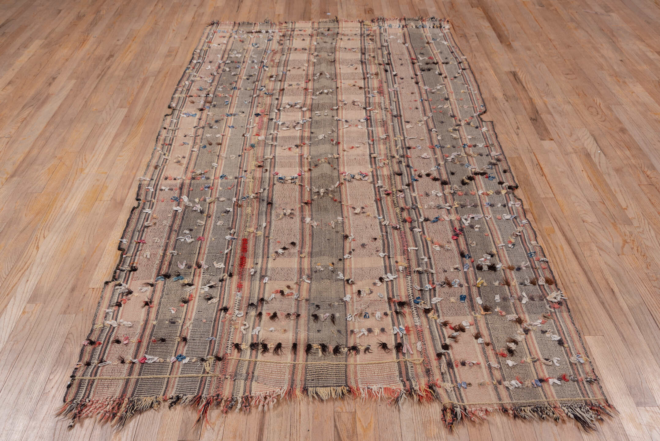 5' x 9' one-of-a-kind handmade vintage Kilim medium size rug. Color palette: taupe, brown, blush, charcoal, ivory, rust