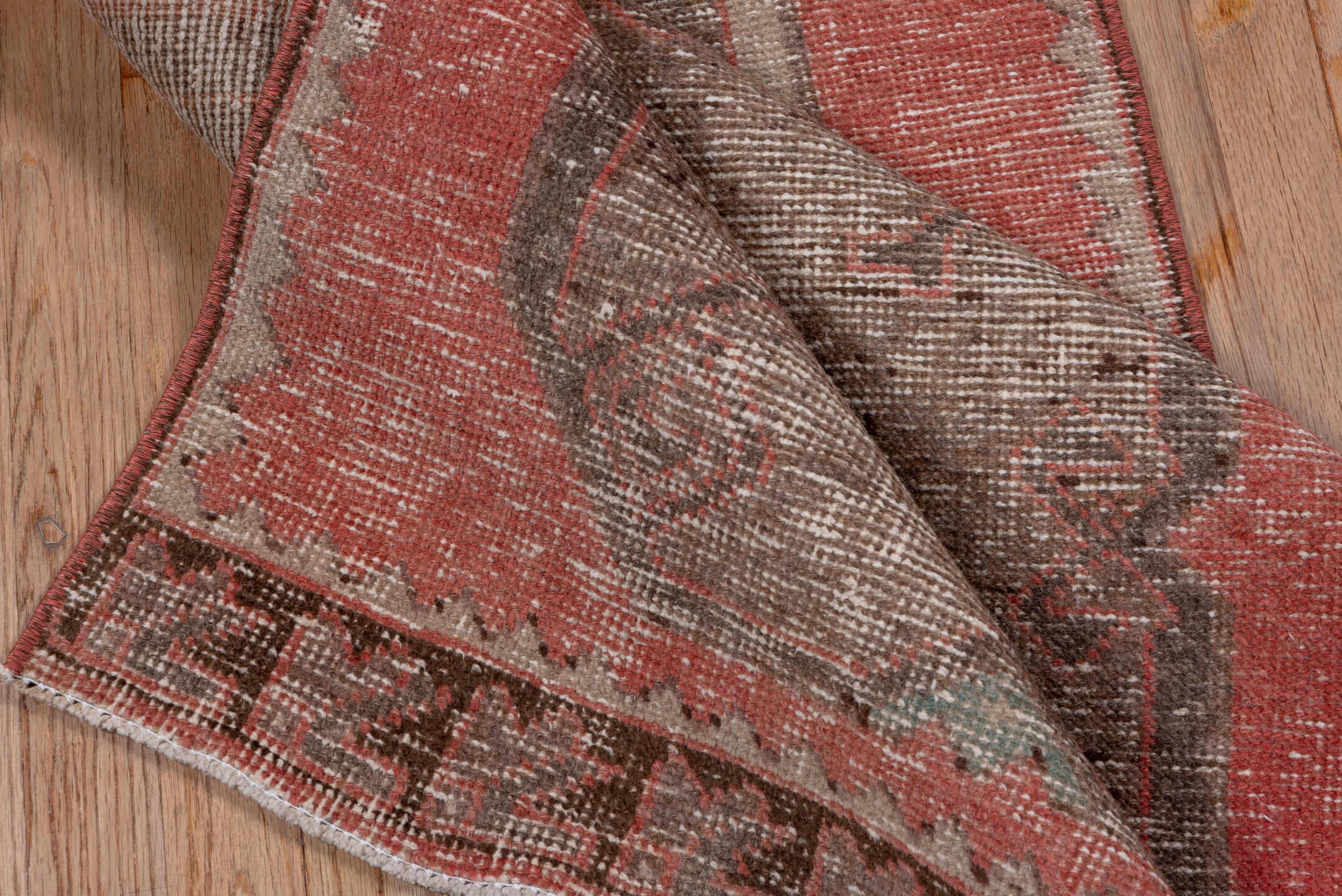 2' x 7' one-of-a-kind handmade vintage Oushak runner rug. Color palette: brown, gray, light gray, off-white, pink, red