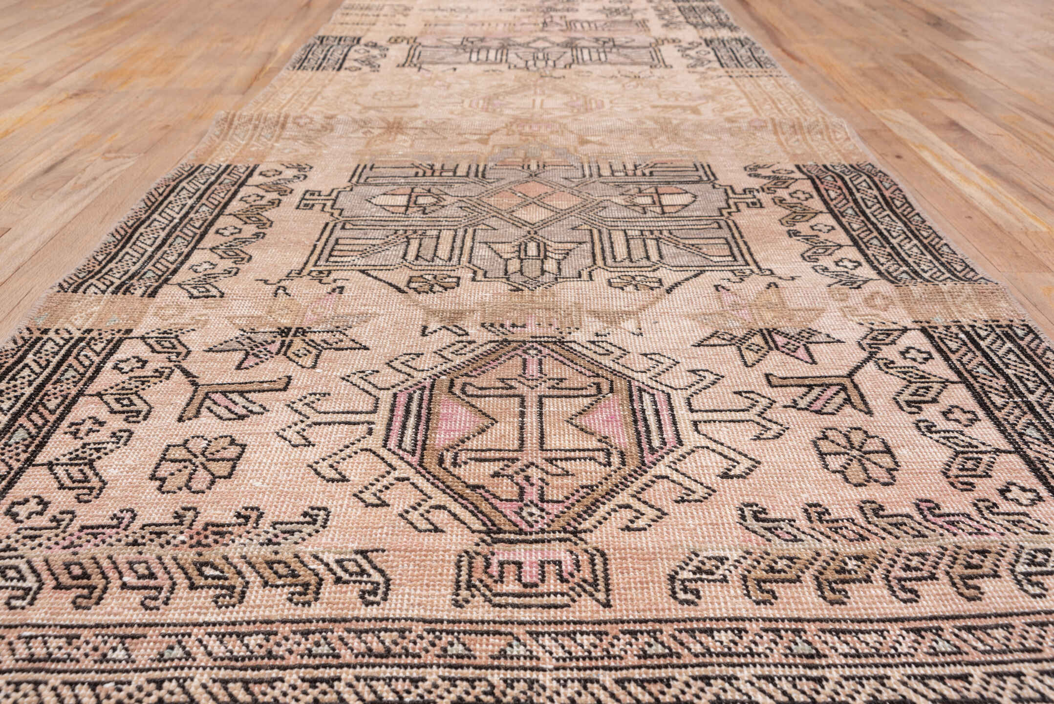 3' x 12' one-of-a-kind handmade vintage Heriz runner rug. Color palette: brown, gray, light gray, off-white, pink, snow