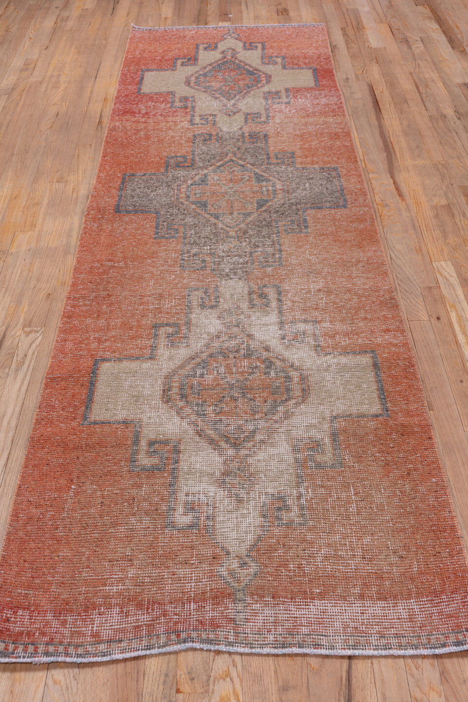 3' x 10' one-of-a-kind handmade vintage Oushak runner rug. Color palette: terra cotta, ivory, charcoal, taupe, rose