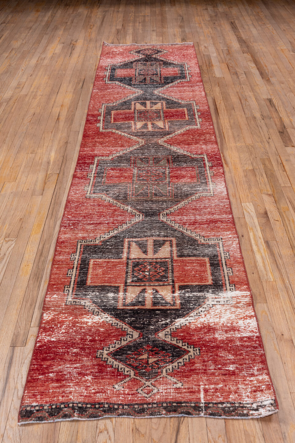 2' x 12' one-of-a-kind handmade vintage Oushak runner rug. Color palette: brown, gray, light gray, off-white, pink, red