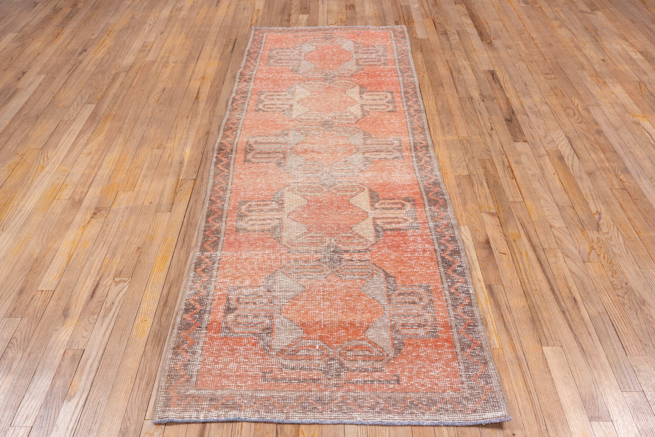 3' x 8' one-of-a-kind handmade vintage Oushak runner rug. Color palette: coral, taupe, ivory, charcoal, rose, camel