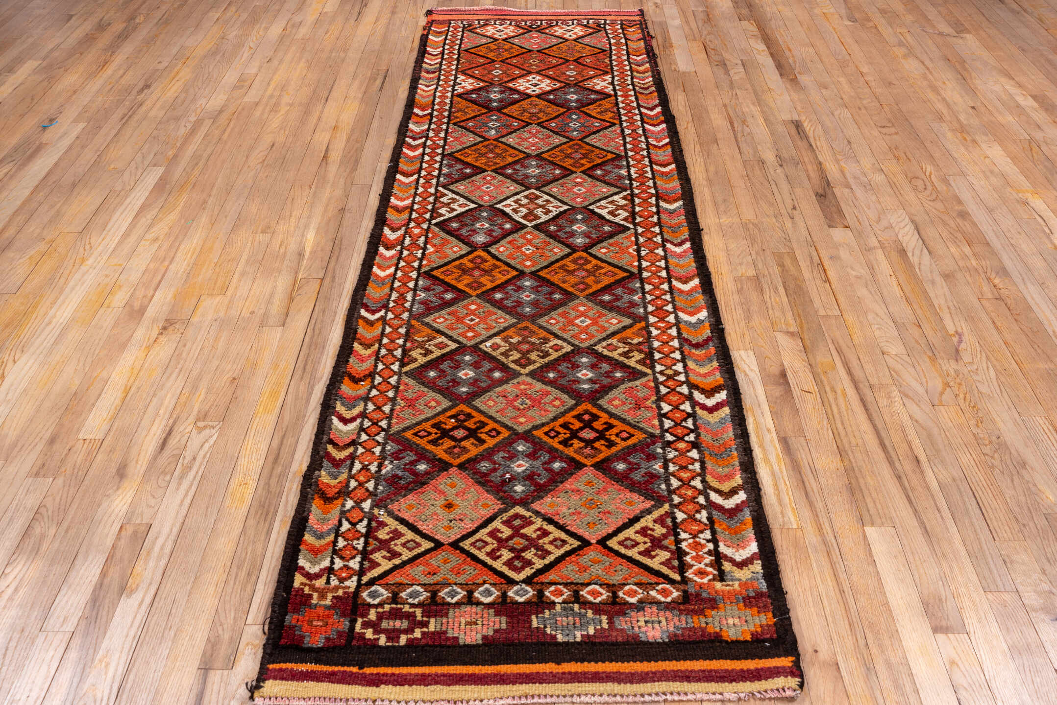 2' x 10' one-of-a-kind handmade vintage Oushak runner rug. Color palette: brown, gray, light gray, off-white, orange, pink