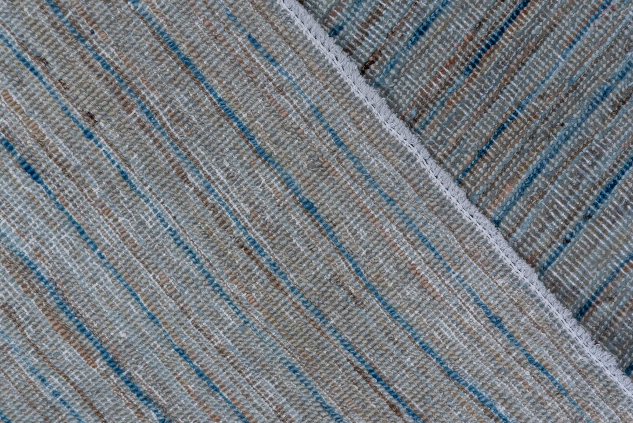 7' x 9' one-of-a-kind handmade vintage Oushak rug. Color palette: blue, slate, gray, taupe, beige