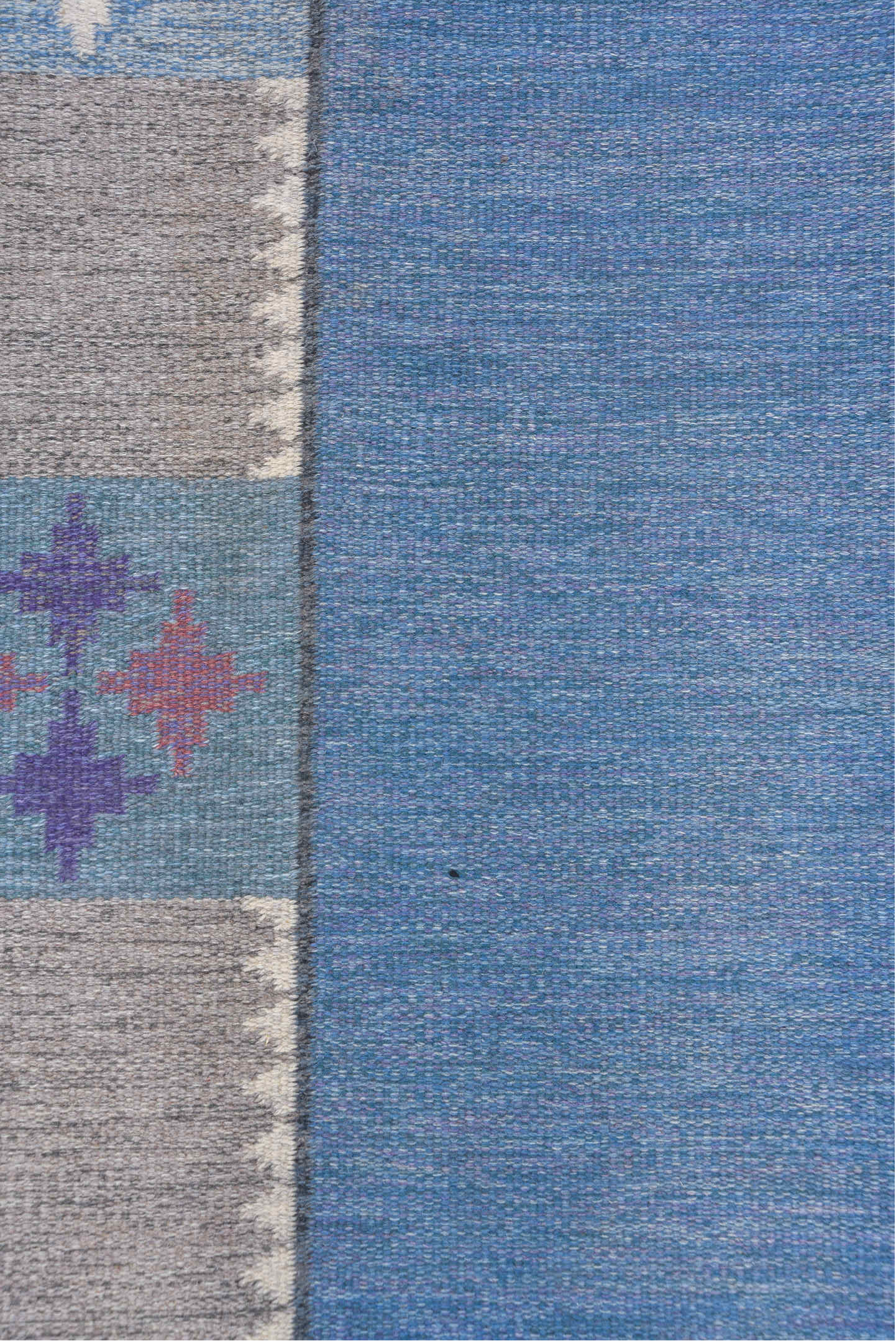 6' x 9' one-of-a-kind handmade vintage Rollaken medium size rug. Color palette: blue, gray, light blue, light gray