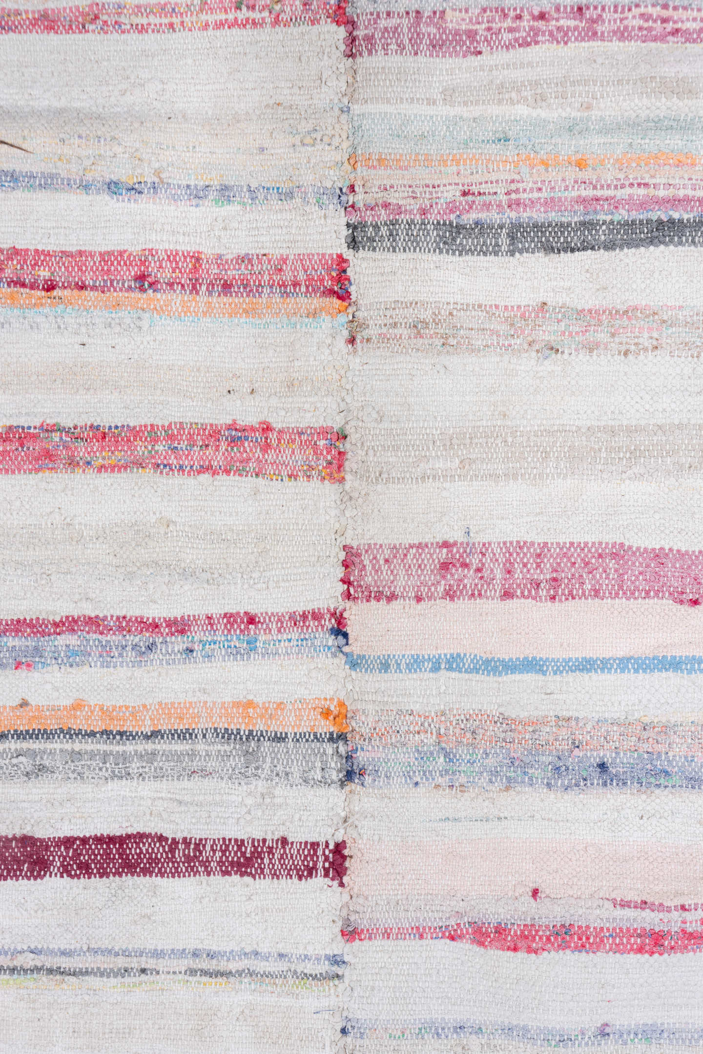 7' x 8' one-of-a-kind handmade antique Rag Rug rug. Color palette: ivory, rose, pale blue, peach, gray, tan, pink, red