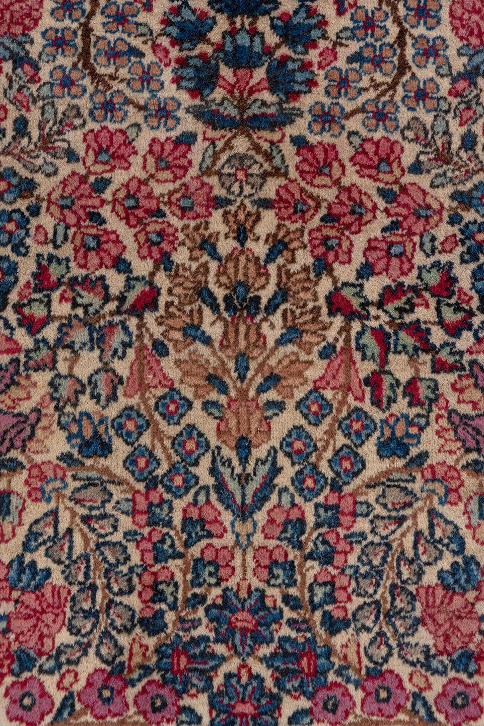2' x 10' one-of-a-kind handmade antique Kerman runner rug. Color palette: ivory, navy, rose, dusty pink, rust, taupe