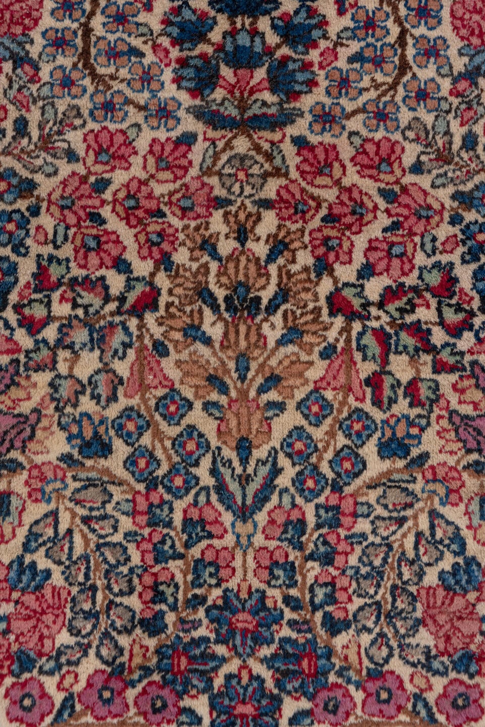 2' x 10' one-of-a-kind handmade antique Kerman runner rug. Color palette: ivory, navy, rose, dusty pink, rust, taupe
