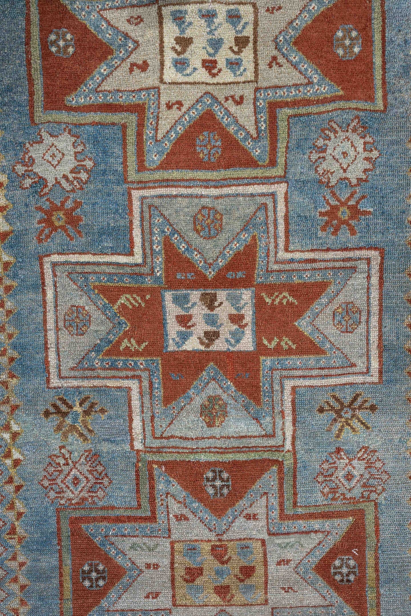 3' x 4' one-of-a-kind handmade antique Caucasian small size rug. Color palette: ivory, sky blue, rust, terra cotta, camel
