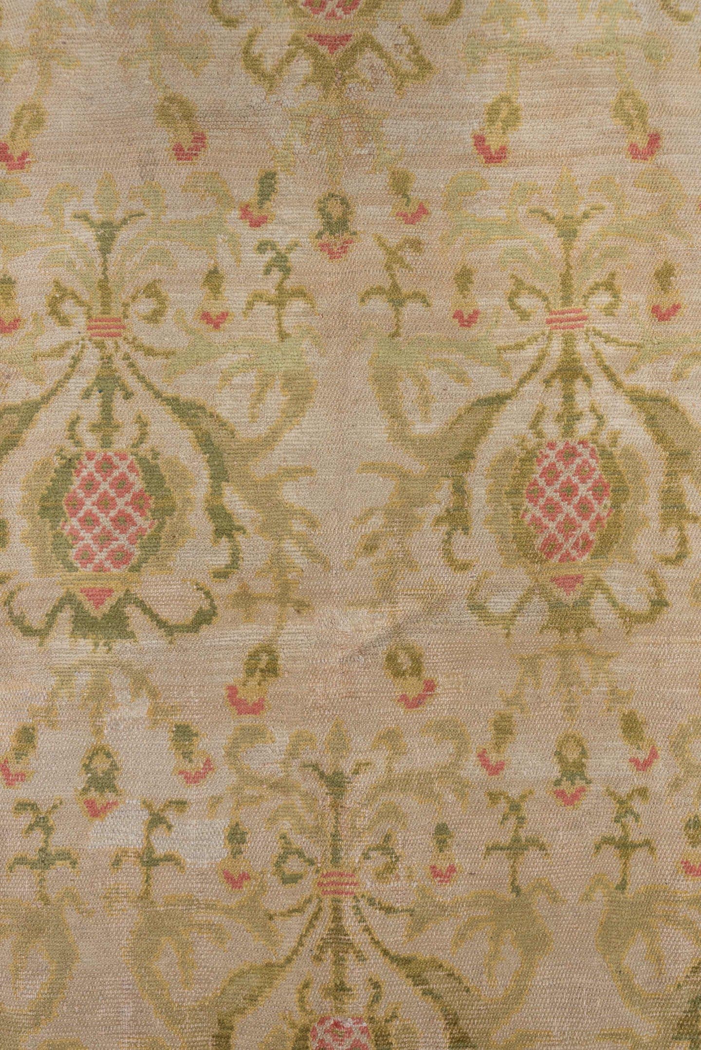5' x 7' one-of-a-kind handmade antique Spanish rug. Color palette: ivory, olive, rose, gold, navy, sage, green, pink, red