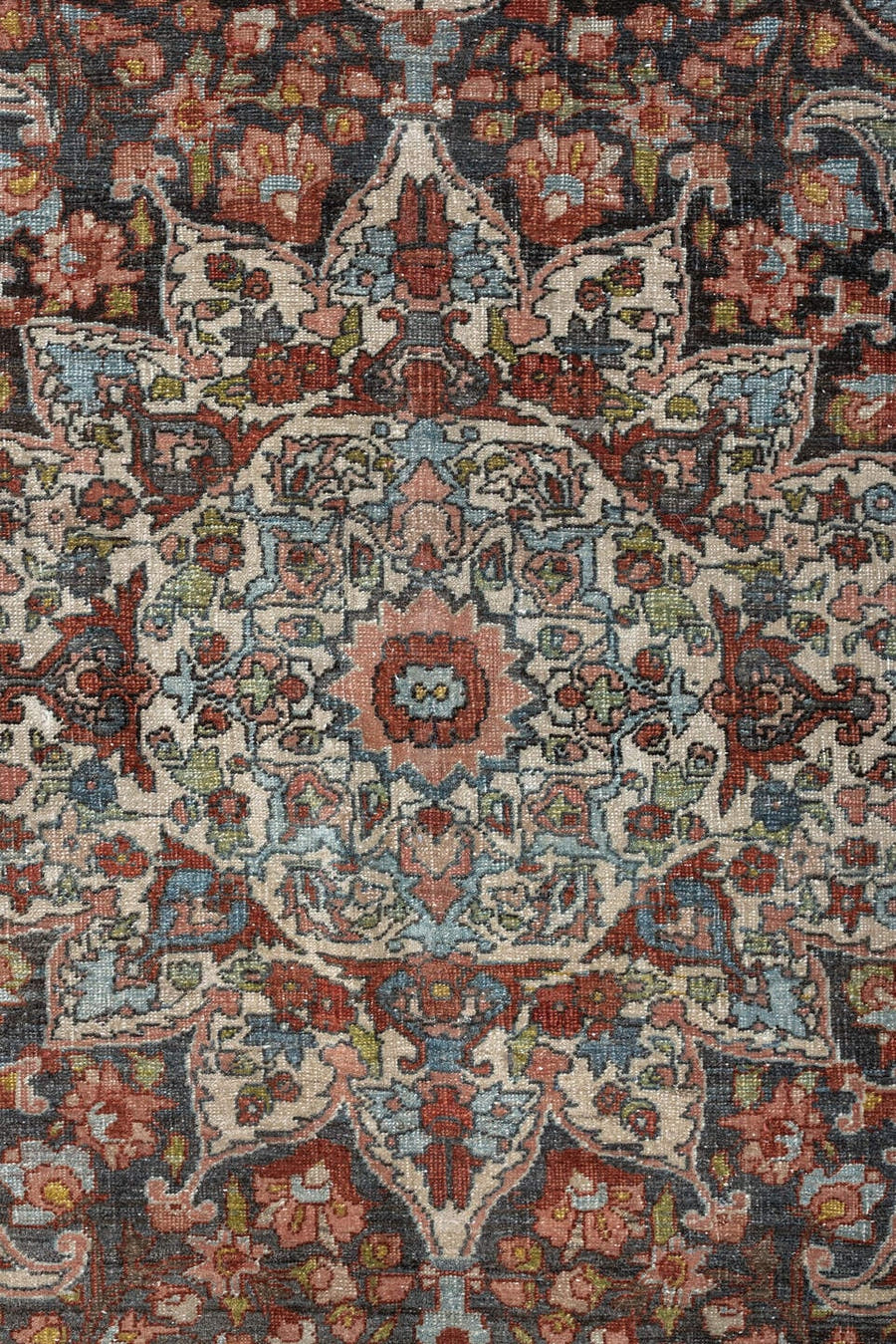 10' x 15' one-of-a-kind handmade antique Baktiary oversize rug. Color palette: terracotta, ivory, charcoal, sky blue, taupe