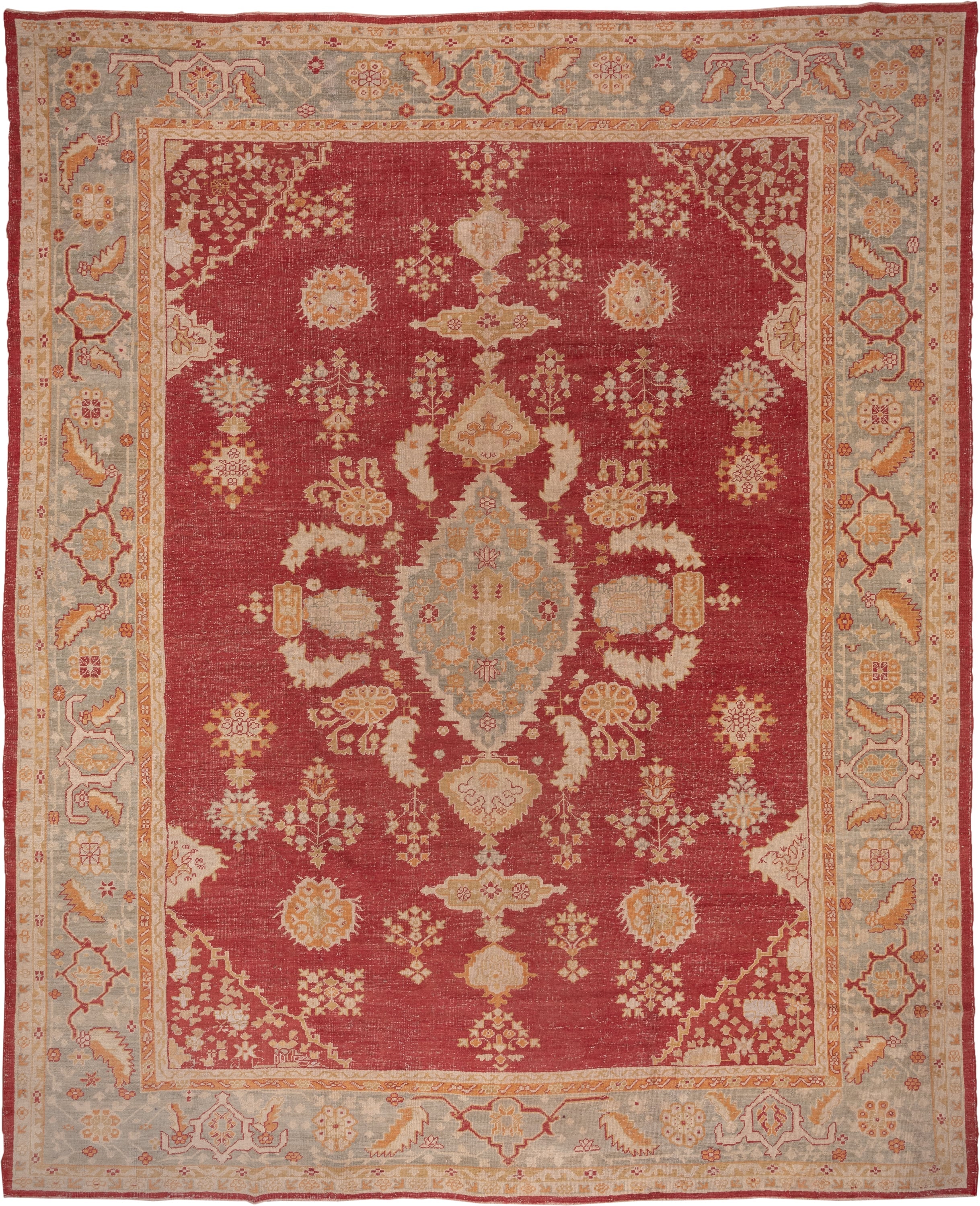 12' x 15' one-of-a-kind handmade antique Oushak oversize rug. Color palette: terracotta, pale blue, ivory, camel, rust, gold