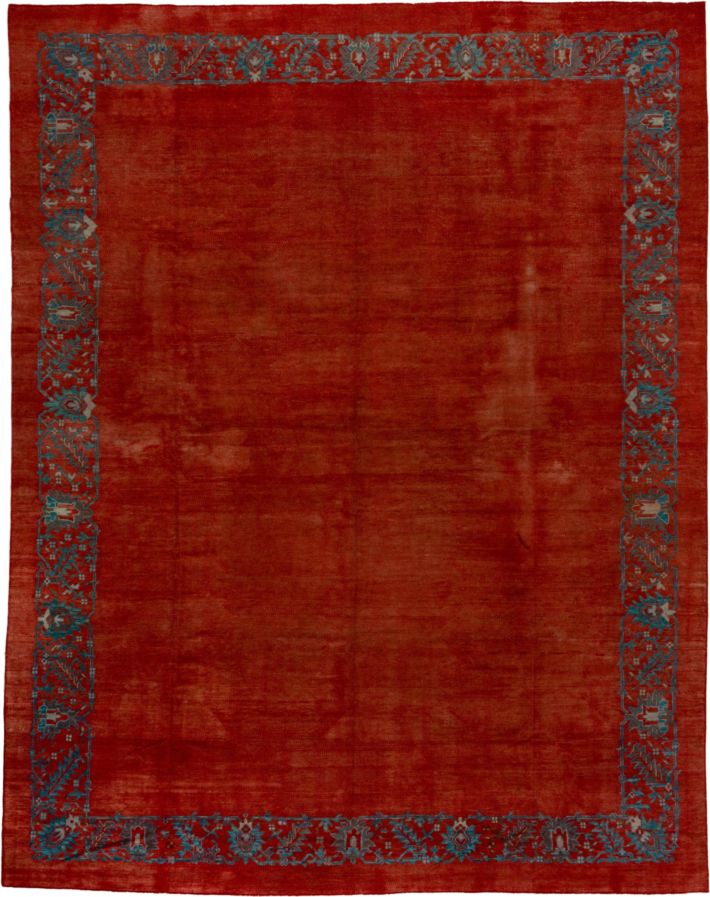 12' x 16' one-of-a-kind handmade antique Oushak oversize rug. Color palette: rust, terra cotta, slate, blue, brick, taupe