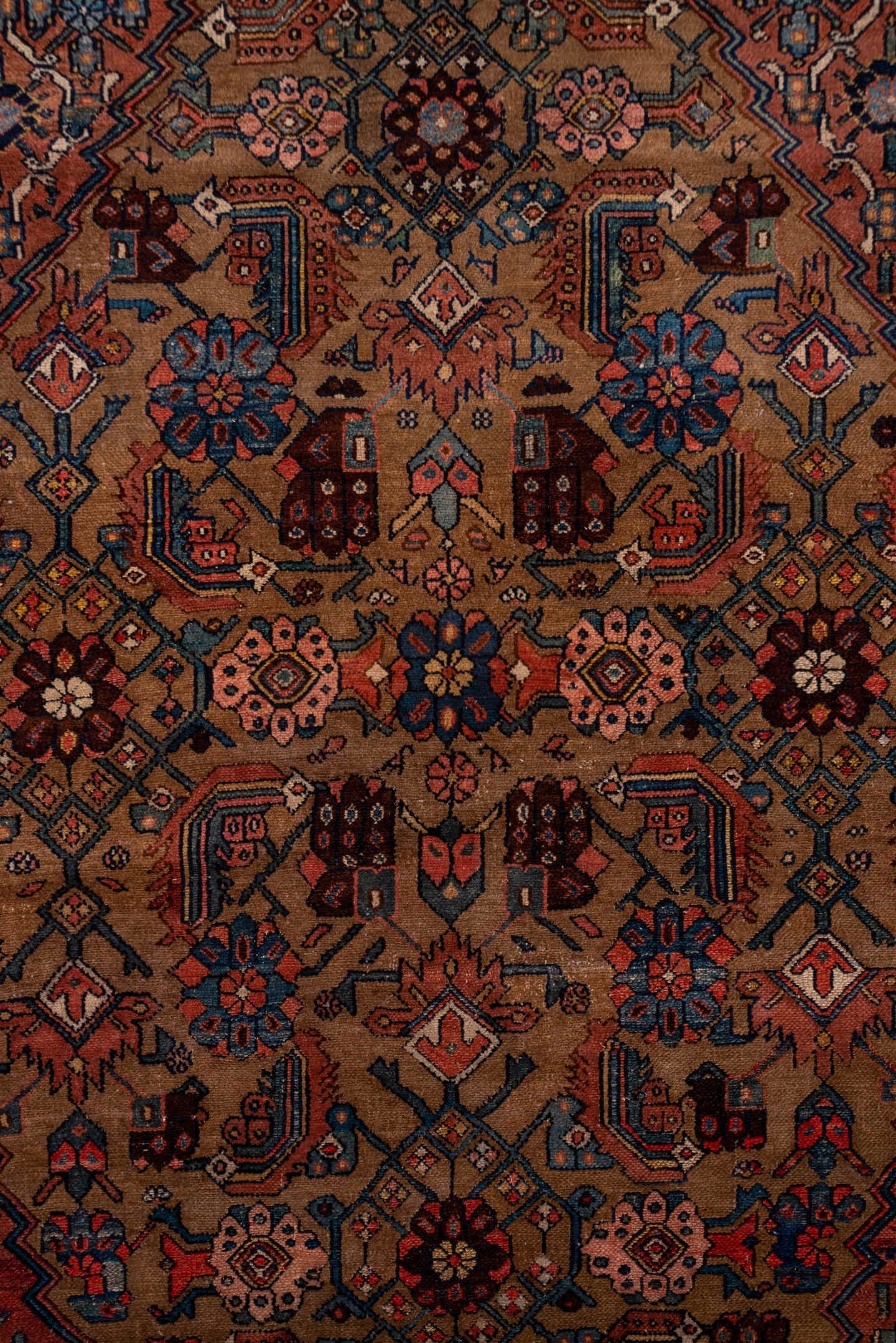 12' x 21' one-of-a-kind handmade antique Bibikabad oversize rug. Color palette: rust, navy, ivory, camel, terra cotta, slate