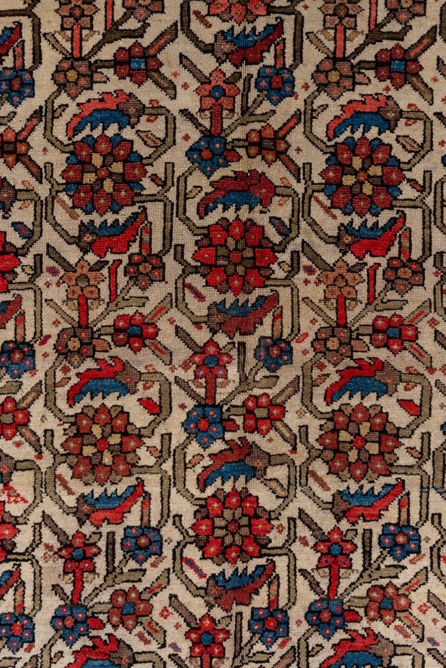 5' x 7' one-of-a-kind handmade antique Malayer rug. Color palette: ivory, rust, indigo, rose, taupe, charcoal, coral