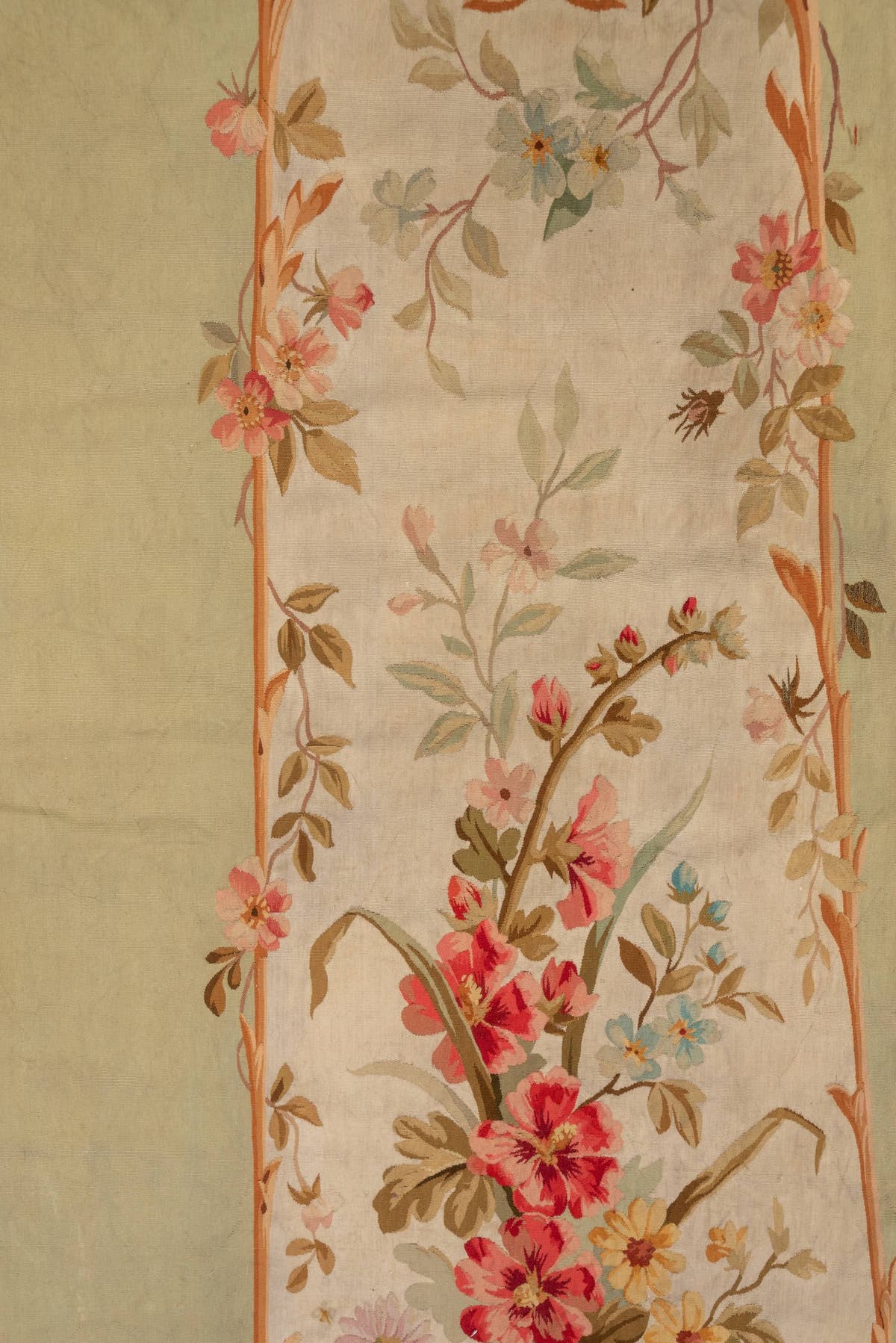 2' x 7' one-of-a-kind handmade antique Aubusson runner rug. Color palette: sage, ivory, rose, coral, gold, taupe, lavender