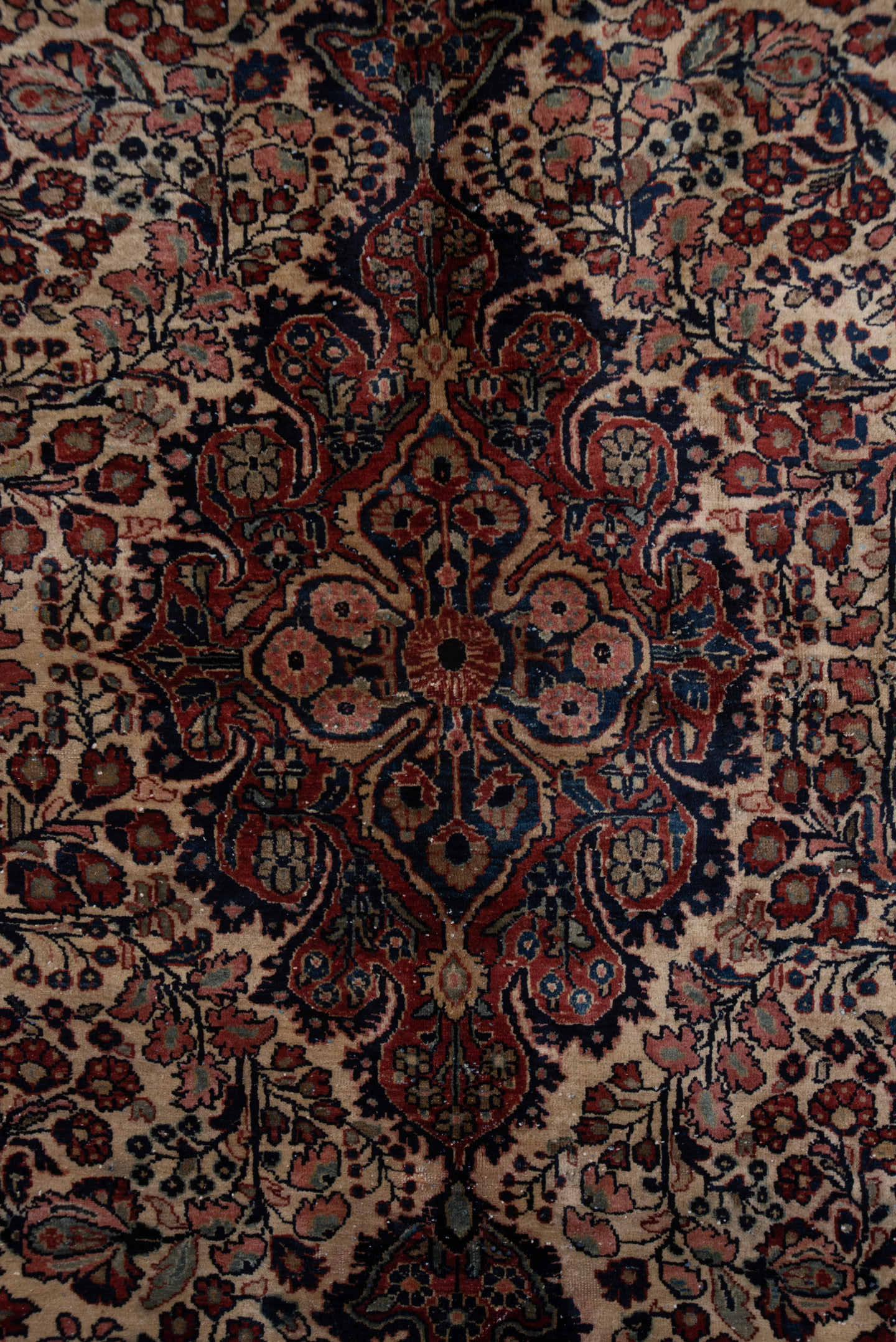 5' x 7' one-of-a-kind handmade antique Sarouk rug. Color palette: ivory, rust, navy, rose, soft blue, burgundy, taupe