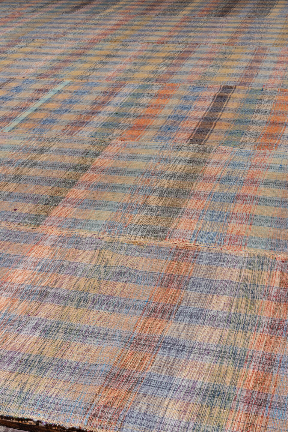 11' x 20' one-of-a-kind handmade vintage Rag Rug oversize rug. Color palette: taupe, blue, rose, peach, gray, ivory, rust