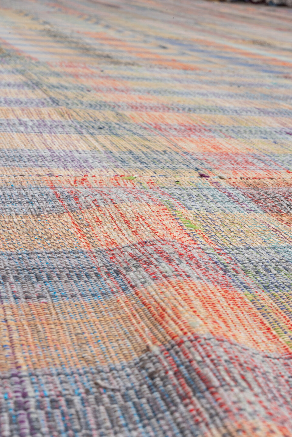 11' x 20' one-of-a-kind handmade vintage Rag Rug oversize rug. Color palette: taupe, blue, rose, peach, gray, ivory, rust