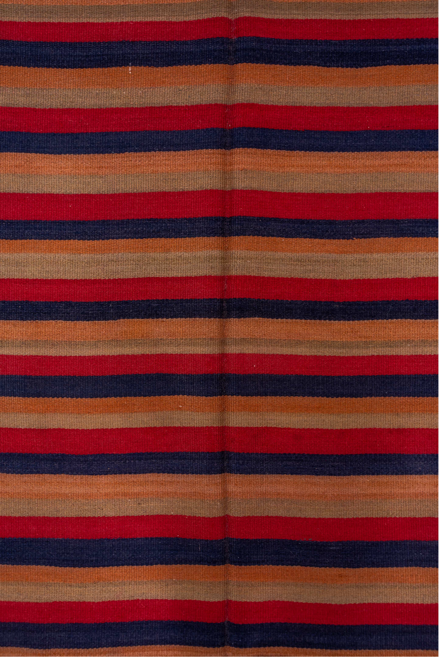 4' x 10' one-of-a-kind handmade vintage Kilim runner rug. Color palette: camel, navy, rust, red, tan, beige, blue