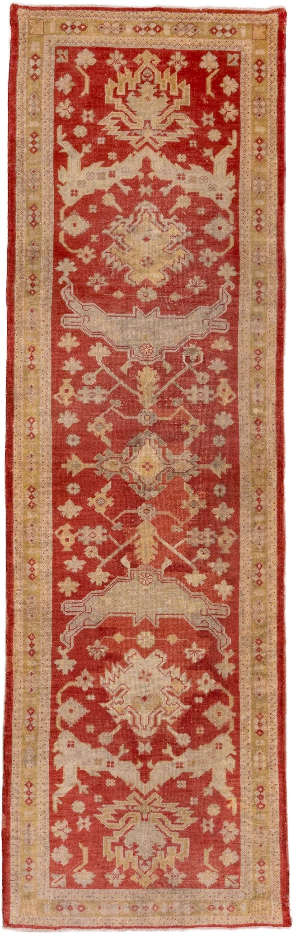 3' x 11' one-of-a-kind handmade vintage Oushak runner rug. Color palette: terra cotta, ivory, beige, rust, camel, rose